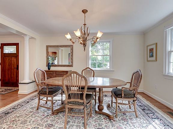 Bright Dining Room with access to the Butler's Pantry and Kitchen