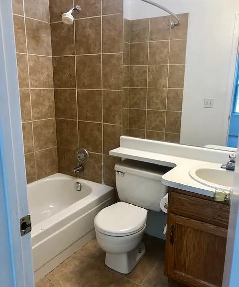 Full bath ensuite for each of the primary bedrooms located on upper level