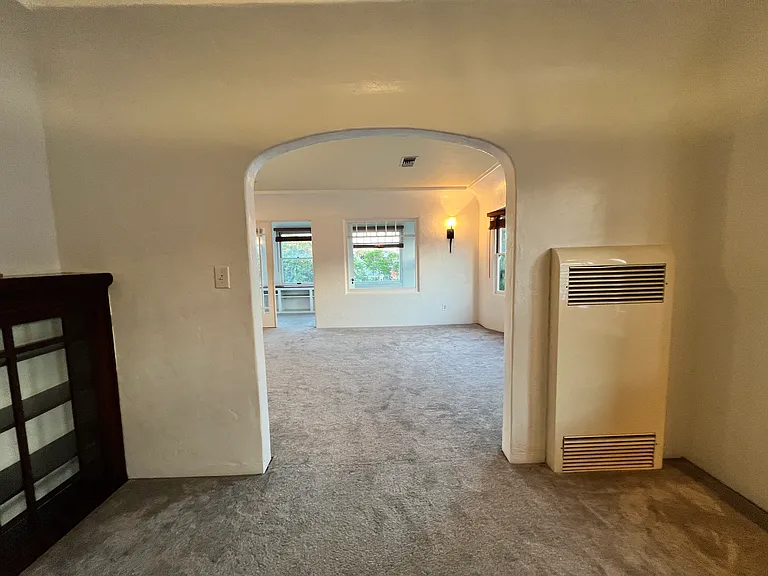 view into living room and out to porch