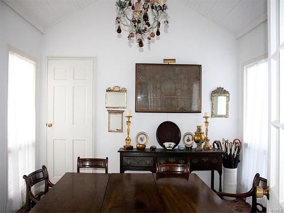 The finished vestibule connects the garage and the home. Another door leads you to the backyard. The