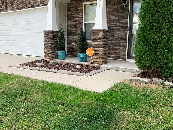 Front porch and storm door.