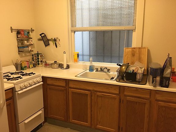 Along the hall toward the back are the kitchen, bath and the