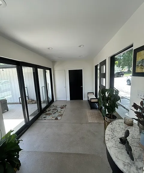 Front Atrium with door to garage