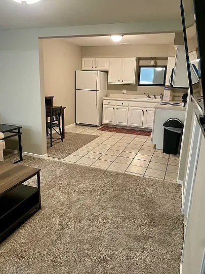 Full kitchen on lower level adjacent to family room.