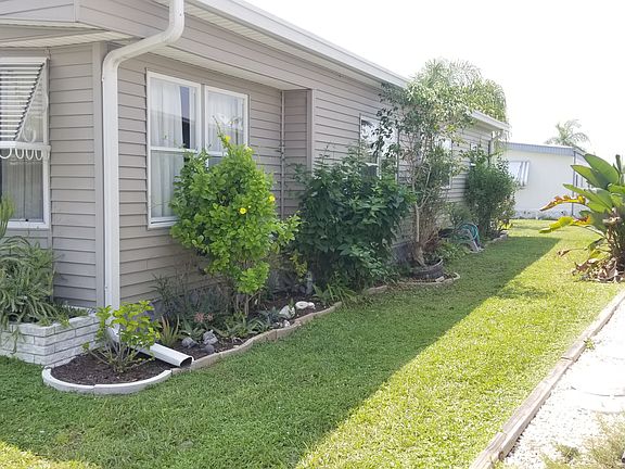 Side yard flower beds