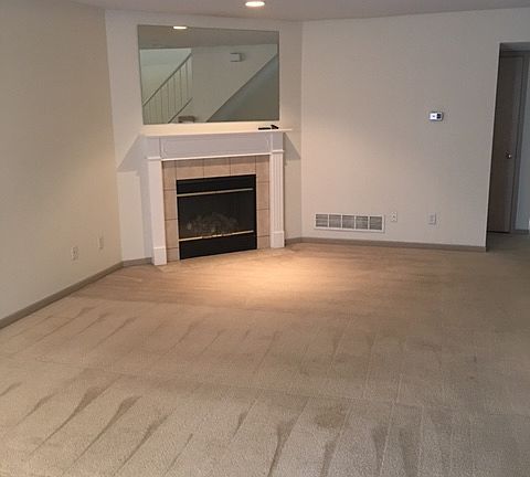 Open floor plan from kitchen to living room.