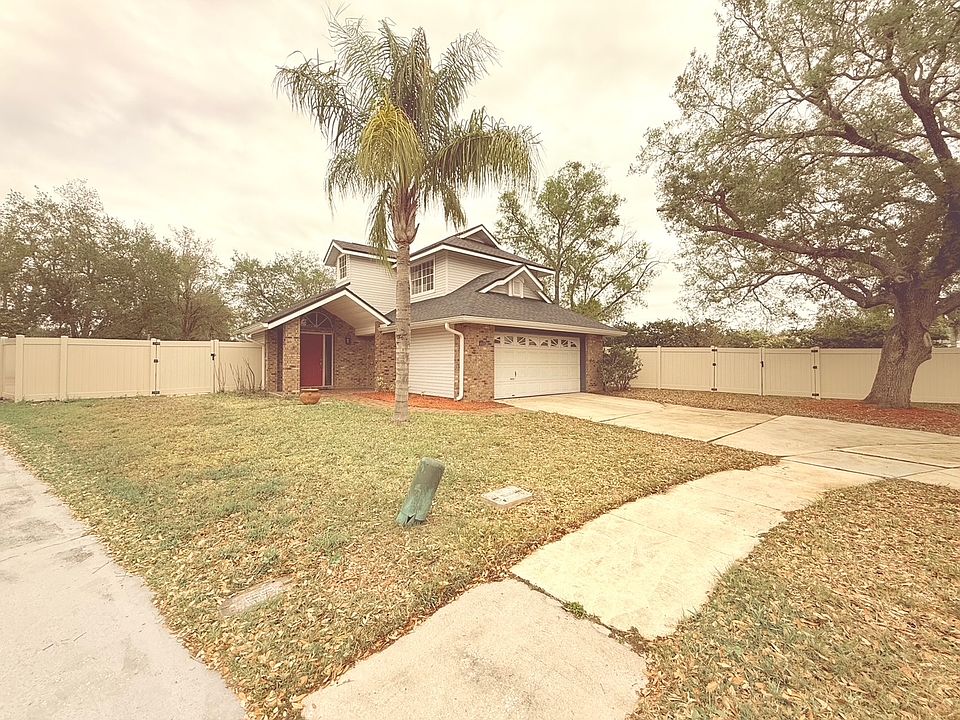 Left curb view of Home from cul-de-sac.