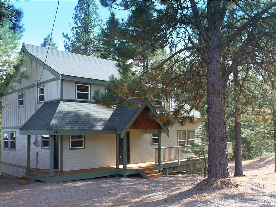 Nestled in the trees with remarkable privacy within the city limits!