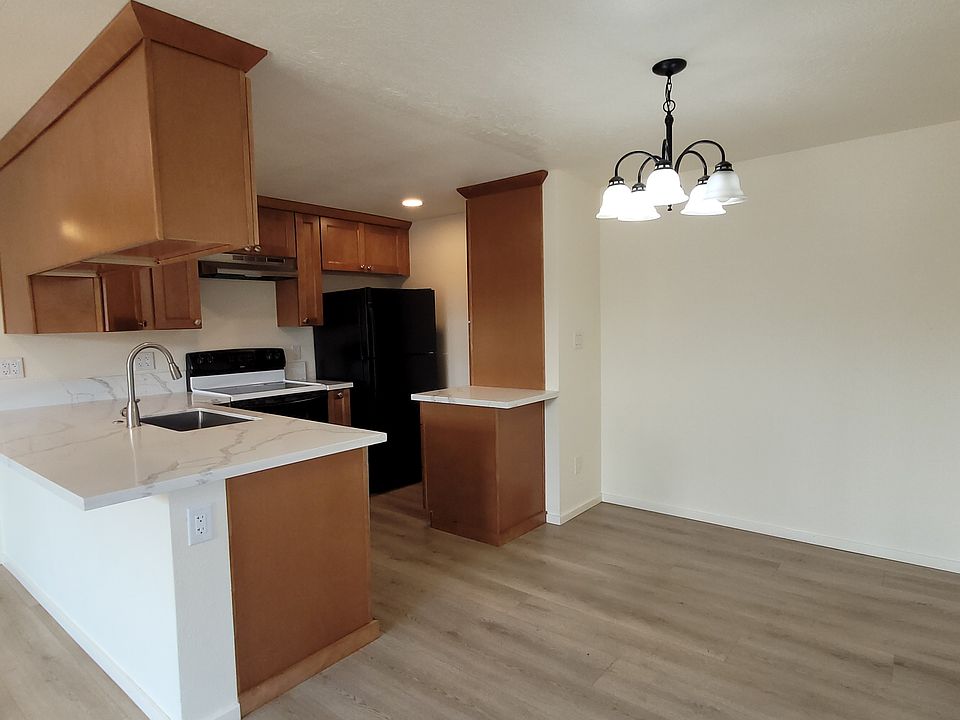 dining room off the kitchen and counter space for bar stools
