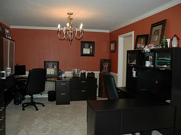 Huge Dining room currently being used as a Study.
