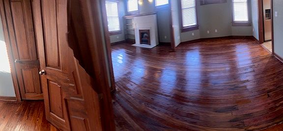 Dining room to living room, hallway on left