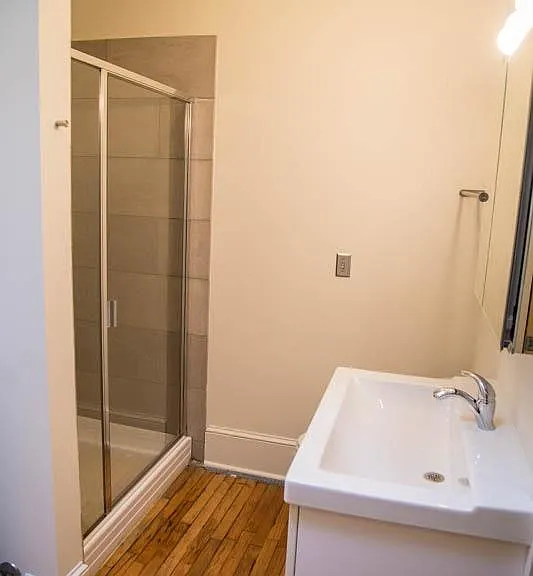 Bathrooms have large marble walk-in showers