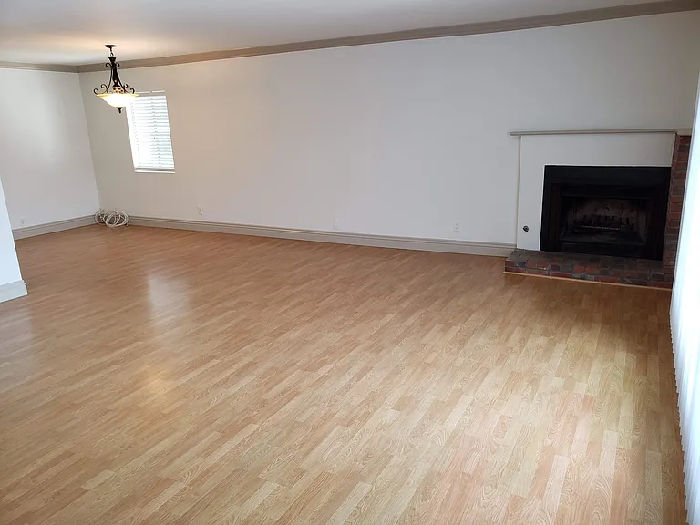 Living room and dining room viewed from front door.