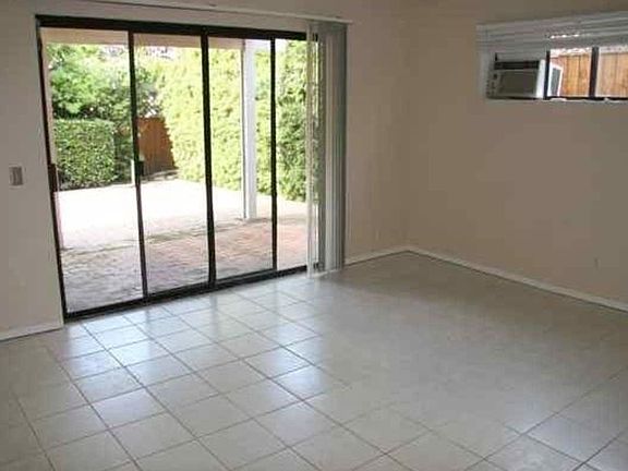 Master bedroom with access to back yard