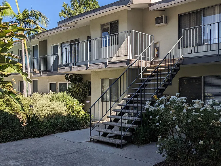 Innear courtyard stairway to second floor apartments at Los Robles in Pasadena, California.