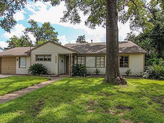 Mature trees in a quiet, established neighborhood.