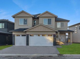 202 NE Kinniburgh Loop, Chestermere, AB T1X2S7