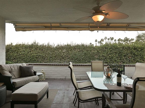 The covered patio, with a new retractable awning and ceiling fan, allows you enjoy the patio anytime of the day or night.