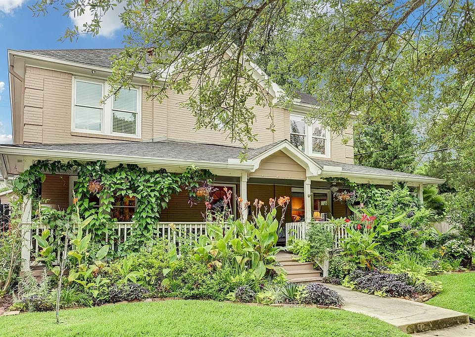 Utterly charming period home with a "cottage in the city" feel. Fantastic curb appeal with lush landscaping and fabulous front porch.