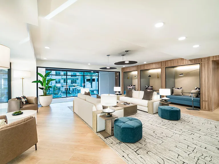 Ample seating and cozy alcoves make this lounge the perfect spot to unwind, work remotely, or catch up with neighbors.