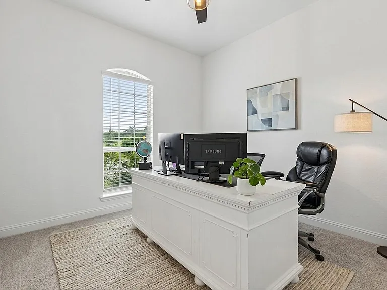 Home office is spacious, AND this desk can stay if desired!