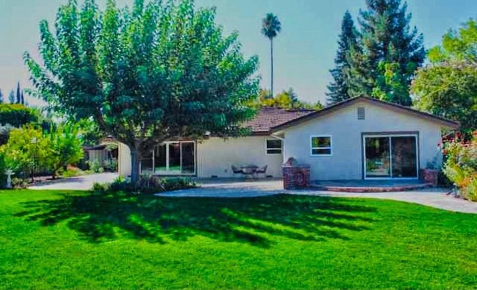 Huge backyard lawn area for kids and adults alike.
