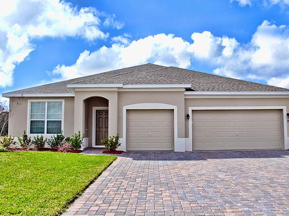 Stucco shown with optional 3-car garage