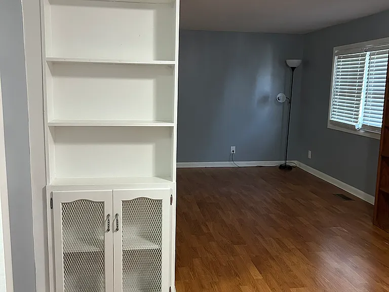View of the Dining Room to Living Room from the Side Door