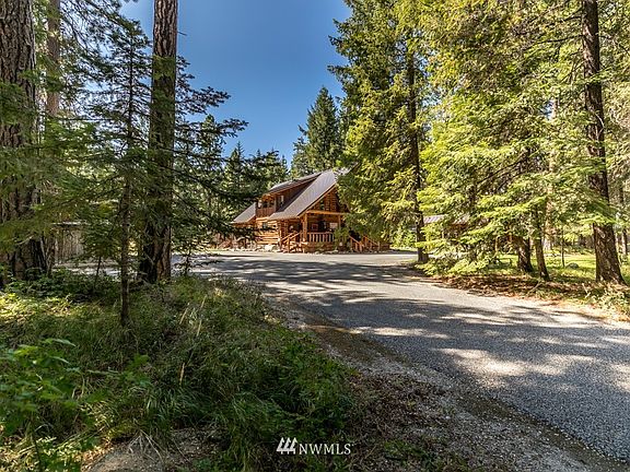 Mountain Living discovered.  Serene setting nestled in the Pines of Lake Wenatchee.