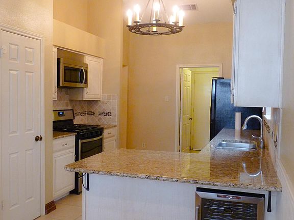 Updated kitchen with 5 burner stove (refrigerator included)
