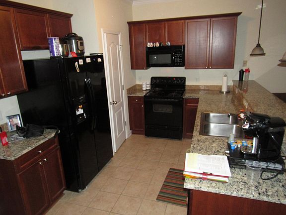 Open kitchen, granite counter tops, sit up bar for extra dining