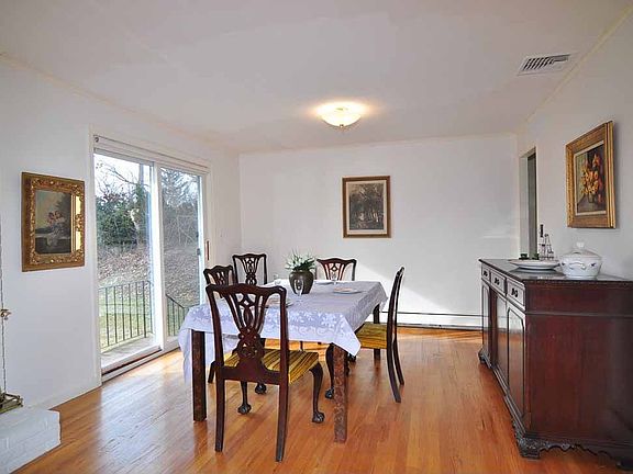 diningroom with sliders to back yard