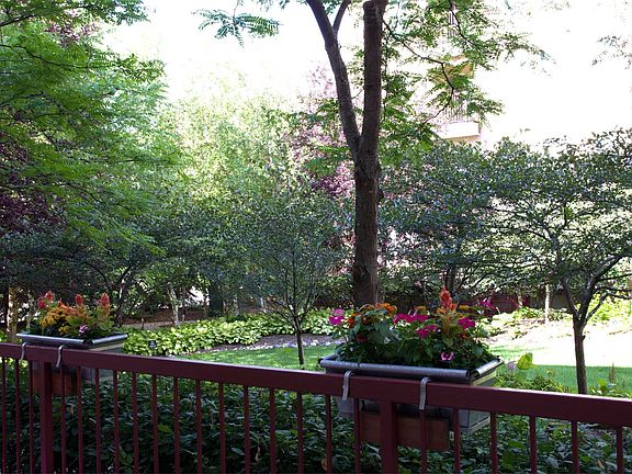 Faces lush courtyard