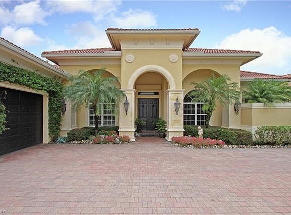 Lovely Front Elevation with Paver Drive.