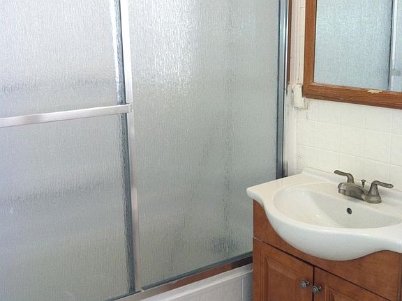 Renovated bathroom with large tub