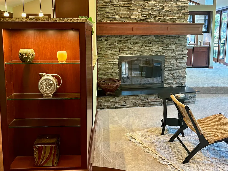 Built-in display cabinets off foyer.