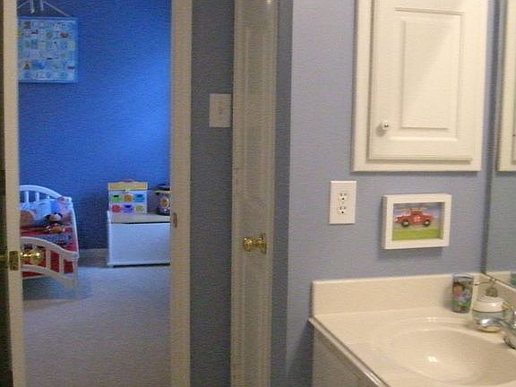 Bathroom looking into bedroom