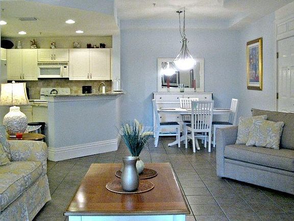 The living room, dining room and kitchen are all open