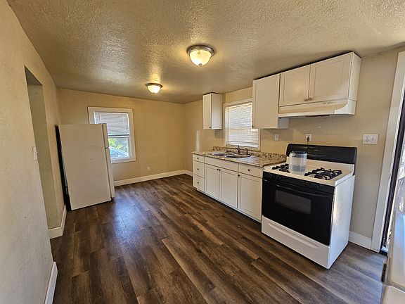 Kitchen, door leads to back yard