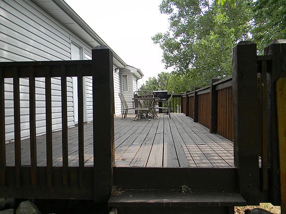 Large Deck on back of home and fenced in yard