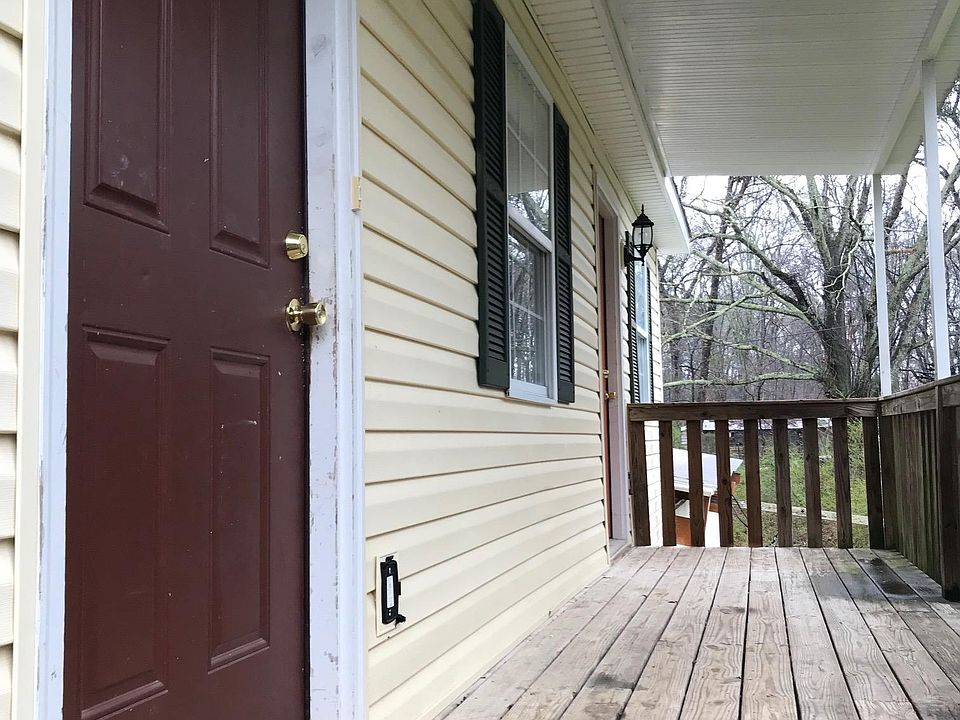 Nice long front porch with 2 entry doors