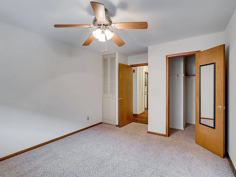 Welcome to Central Lakes of Uptown, where comfort meets convenience. This spacious living area features a ceiling fan and ample closet space for all your needs. Embrace modern living in a vibrant community. Schedule your tour today!