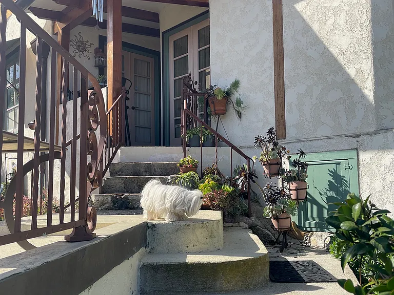 Private Entry and Porch to Guest Suite & Stairs down to Entry Gate or right to gardens