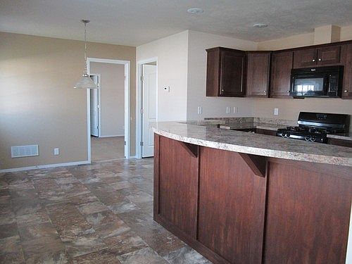 2nd image of 609 Fresno Cir SE