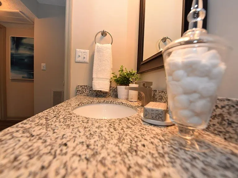 Bright bathroom with granite counters