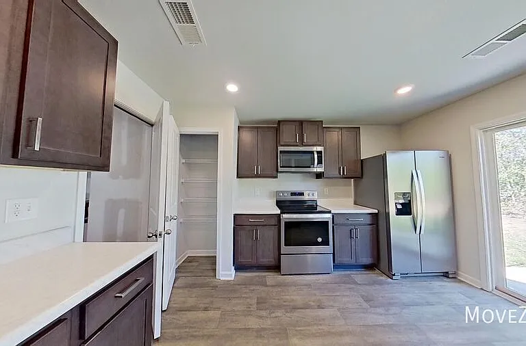 9319 Vineyard Grove Ln NE — Photo 17