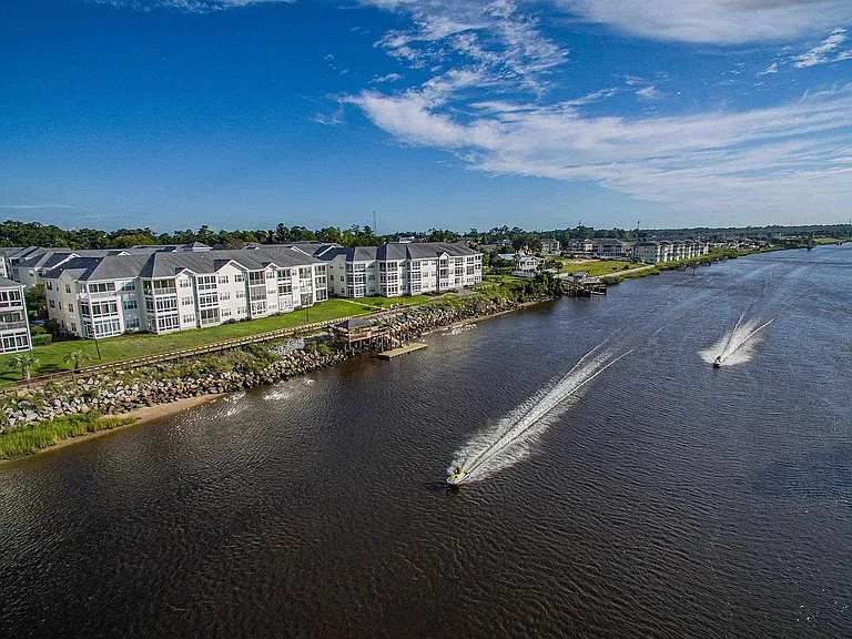 Carolina Keyes, condo is southwest ground floor end unit in center building