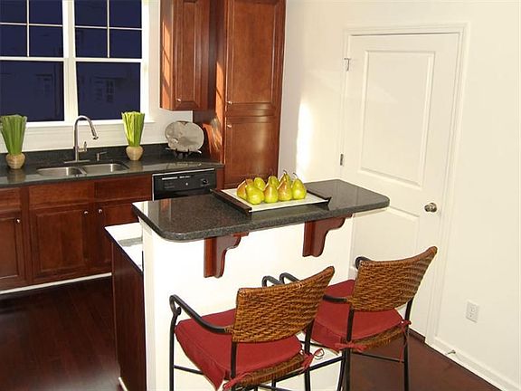 The kitchen is full of upgrades. Beautiful granite counter tops and cabinetry