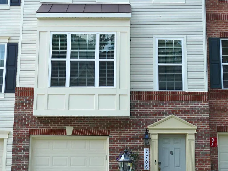 7706 Gaston Pl — Photo 1