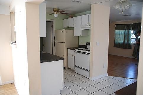 Kitchen w/ view of Living Room